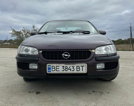 Красный Опель Омега, объемом двигателя 2.5 л и пробегом 313 тыс. км за 1500 $, фото 1 на Automoto.ua