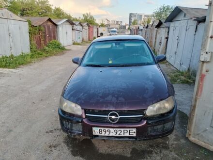 Червоний Опель Омега, об'ємом двигуна 2 л та пробігом 350 тис. км за 850 $, фото 1 на Automoto.ua
