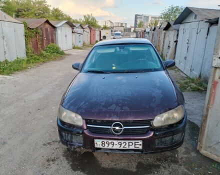 Красный Опель Омега, объемом двигателя 2 л и пробегом 350 тыс. км за 850 $, фото 1 на Automoto.ua
