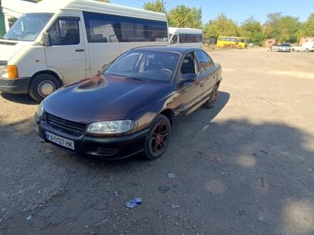 Опель Омега 1995 в Херсоне на Automoto.ua Красный Опель Омега, объемом двигателя 2.5 л и пробегом 350 тыс. км за 1300 $, фото 1 на Automoto.ua