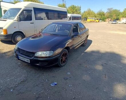 Червоний Опель Омега, об'ємом двигуна 2.5 л та пробігом 350 тис. км за 1300 $, фото 1 на Automoto.ua