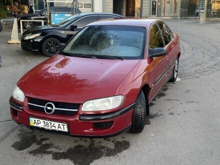 Опель Омега 1995 у Запоріжжя на Automoto.ua Червоний Опель Омега, об'ємом двигуна 2 л та пробігом 203 тис. км за 1550 $, фото 1 на Automoto.ua
