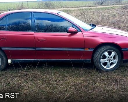 Красный Опель Омега, объемом двигателя 2 л и пробегом 300 тыс. км за 1500 $, фото 1 на Automoto.ua
