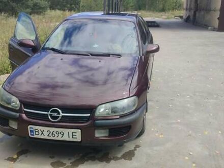 Опель Омега 1995 в Славуте на Automoto.ua Красный Опель Омега, объемом двигателя 2 л и пробегом 382 тыс. км за 2300 $, фото 1 на Automoto.ua