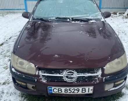 Красный Опель Омега, объемом двигателя 2.5 л и пробегом 390 тыс. км за 2000 $, фото 1 на Automoto.ua