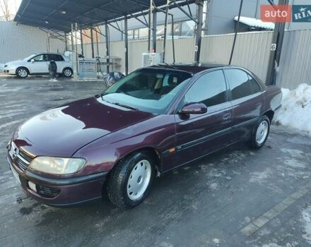 Красный Опель Омега, объемом двигателя 2 л и пробегом 280 тыс. км за 2000 $, фото 1 на Automoto.ua