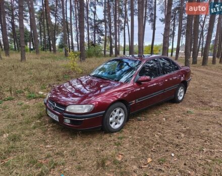 Красный Опель Омега, объемом двигателя 2.5 л и пробегом 208 тыс. км за 2150 $, фото 1 на Automoto.ua