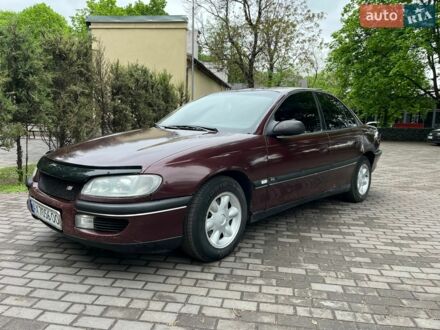 Червоний Опель Омега, об'ємом двигуна 2 л та пробігом 585 тис. км за 2600 $, фото 1 на Automoto.ua