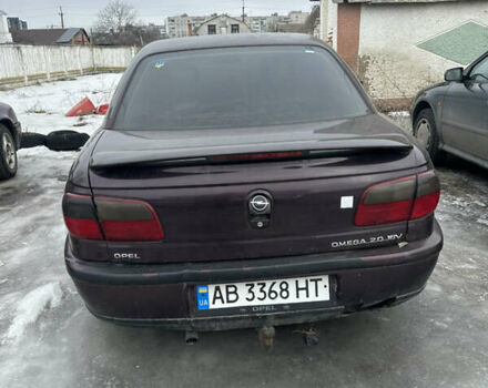 Красный Опель Омега, объемом двигателя 2 л и пробегом 250 тыс. км за 800 $, фото 1 на Automoto.ua