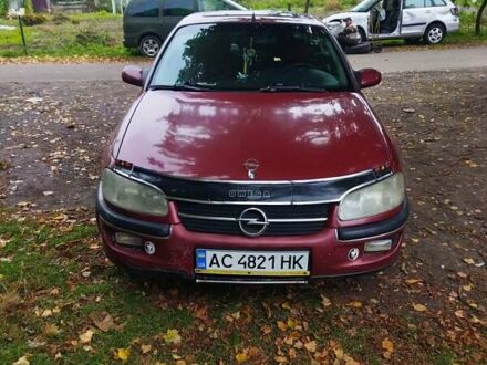Красный Опель Омега, объемом двигателя 2 л и пробегом 300 тыс. км за 2200 $, фото 1 на Automoto.ua