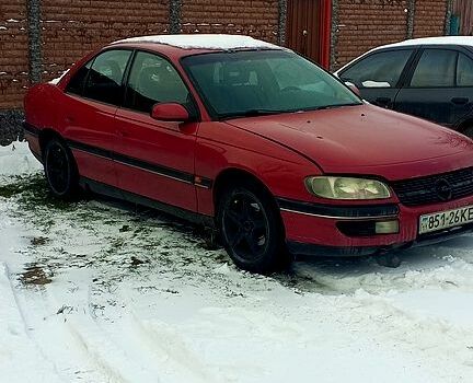 Червоний Опель Омега, об'ємом двигуна 2 л та пробігом 285 тис. км за 1800 $, фото 1 на Automoto.ua