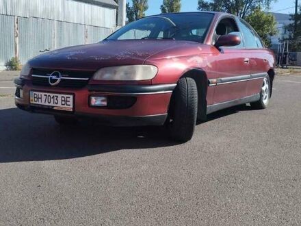 Красный Опель Омега, объемом двигателя 2.5 л и пробегом 316 тыс. км за 2500 $, фото 1 на Automoto.ua