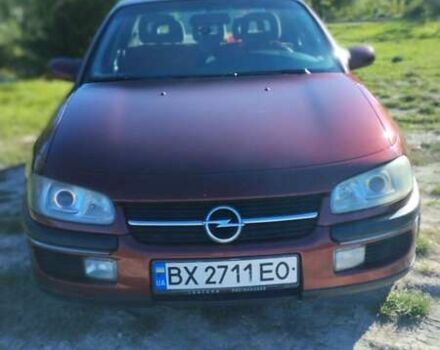 Красный Опель Омега, объемом двигателя 2 л и пробегом 257 тыс. км за 2100 $, фото 1 на Automoto.ua