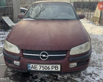 Красный Опель Омега, объемом двигателя 2 л и пробегом 367 тыс. км за 2300 $, фото 1 на Automoto.ua