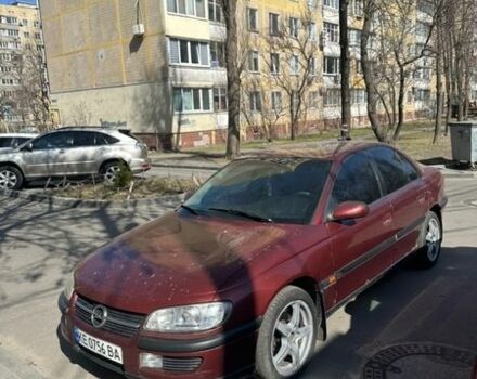 Красный Опель Омега, объемом двигателя 2 л и пробегом 390 тыс. км за 1550 $, фото 1 на Automoto.ua