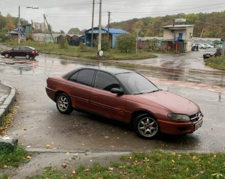 Червоний Опель Омега, об'ємом двигуна 2 л та пробігом 2 тис. км за 1400 $, фото 1 на Automoto.ua