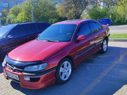Опель Омега 1996 в Кропивницком (Кировограде) на Automoto.ua Красный Опель Омега, объемом двигателя 2 л и пробегом 520 тыс. км за 3300 $, фото 1 на Automoto.ua