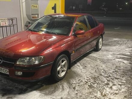 Опель Омега 1996 в Новомосковске на Automoto.ua Красный Опель Омега, объемом двигателя 2 л и пробегом 400 тыс. км за 1600 $, фото 1 на Automoto.ua