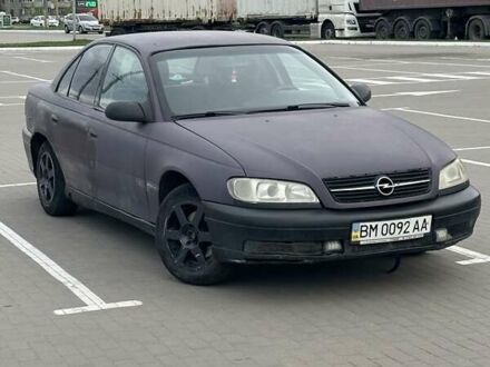 Красный Опель Омега, объемом двигателя 2 л и пробегом 340 тыс. км за 1999 $, фото 1 на Automoto.ua