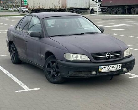 Червоний Опель Омега, об'ємом двигуна 2 л та пробігом 340 тис. км за 1600 $, фото 1 на Automoto.ua