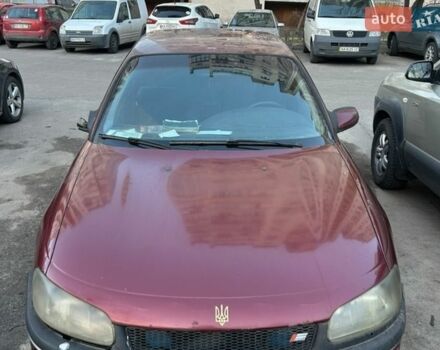 Красный Опель Омега, объемом двигателя 2 л и пробегом 385 тыс. км за 899 $, фото 1 на Automoto.ua