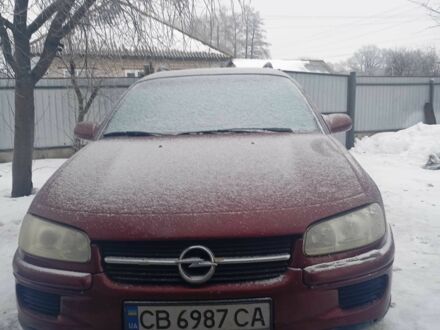 Червоний Опель Омега, об'ємом двигуна 2 л та пробігом 315 тис. км за 2200 $, фото 1 на Automoto.ua