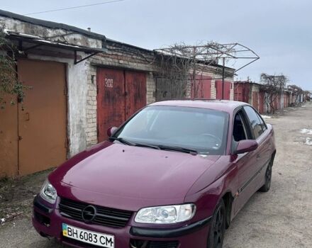Красный Опель Омега, объемом двигателя 3 л и пробегом 1 тыс. км за 1000 $, фото 1 на Automoto.ua