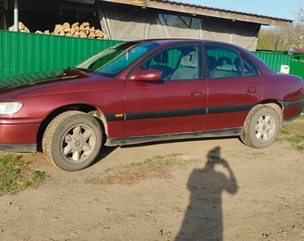 Червоний Опель Омега, об'ємом двигуна 2 л та пробігом 320 тис. км за 1500 $, фото 1 на Automoto.ua