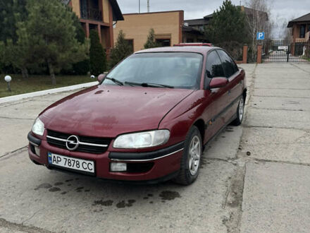 Червоний Опель Омега, об'ємом двигуна 2 л та пробігом 496 тис. км за 1800 $, фото 1 на Automoto.ua