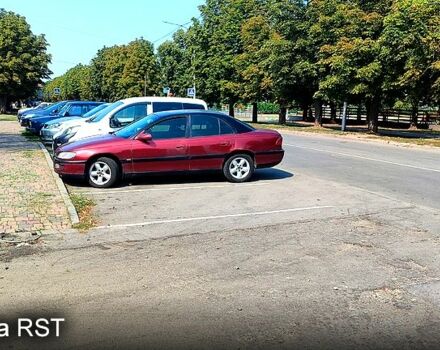 Красный Опель Омега, объемом двигателя 2 л и пробегом 428 тыс. км за 1420 $, фото 1 на Automoto.ua