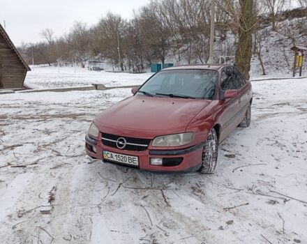 Красный Опель Омега, объемом двигателя 2 л и пробегом 111 тыс. км за 1850 $, фото 1 на Automoto.ua