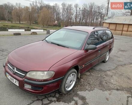Червоний Опель Омега, об'ємом двигуна 2 л та пробігом 317 тис. км за 1450 $, фото 1 на Automoto.ua