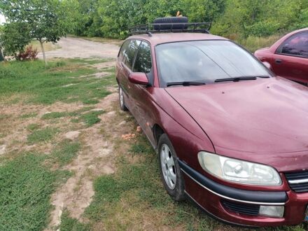 Опель Омега 1997 у Гайсине на Automoto.ua Червоний Опель Омега, об'ємом двигуна 2 л та пробігом 400 тис. км за 1700 $, фото 1 на Automoto.ua