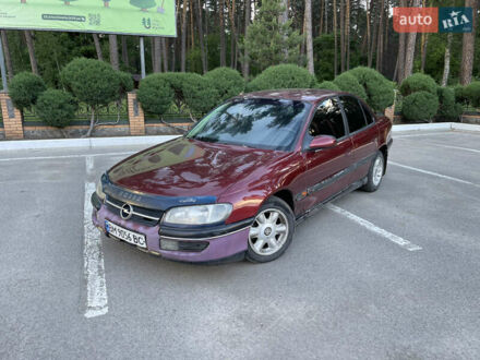 Опель Омега 1997 у Лебедине на Automoto.ua Червоний Опель Омега, об'ємом двигуна 2 л та пробігом 307 тис. км за 1600 $, фото 1 на Automoto.ua