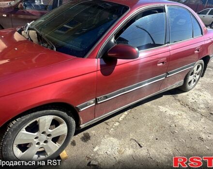 Красный Опель Омега, объемом двигателя 2.5 л и пробегом 290 тыс. км за 2000 $, фото 1 на Automoto.ua