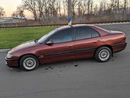 Красный Опель Омега, объемом двигателя 2 л и пробегом 440 тыс. км за 2050 $, фото 1 на Automoto.ua