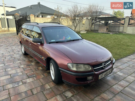 Червоний Опель Омега, об'ємом двигуна 2 л та пробігом 310 тис. км за 1200 $, фото 1 на Automoto.ua