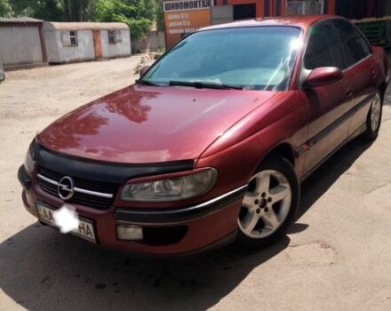 Красный Опель Омега, объемом двигателя 2 л и пробегом 280 тыс. км за 2799 $, фото 1 на Automoto.ua