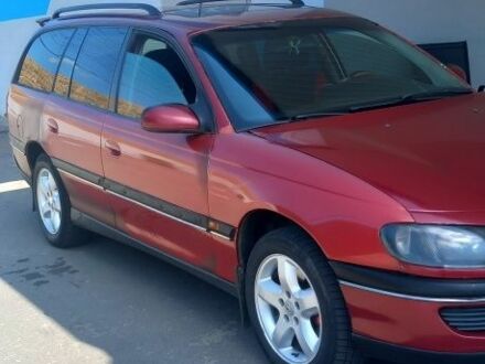 Красный Опель Омега, объемом двигателя 2 л и пробегом 350 тыс. км за 1500 $, фото 1 на Automoto.ua