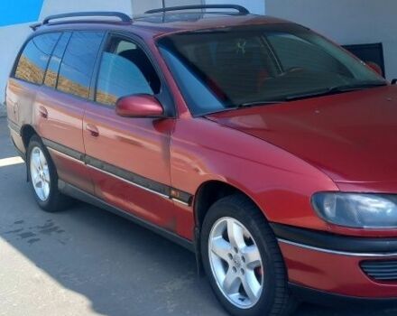 Красный Опель Омега, объемом двигателя 2 л и пробегом 350 тыс. км за 1500 $, фото 1 на Automoto.ua