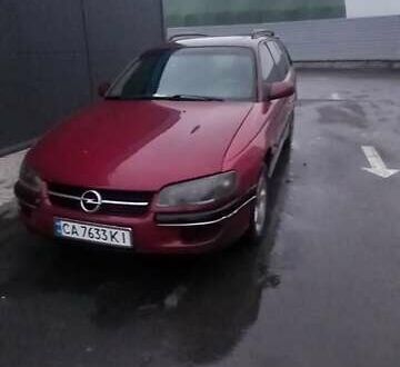 Червоний Опель Омега, об'ємом двигуна 2 л та пробігом 450 тис. км за 1500 $, фото 1 на Automoto.ua
