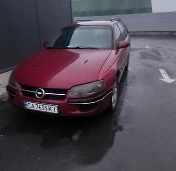 Красный Опель Омега, объемом двигателя 2 л и пробегом 450 тыс. км за 1500 $, фото 1 на Automoto.ua