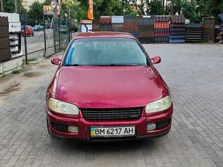 Красный Опель Омега, объемом двигателя 2.5 л и пробегом 344 тыс. км за 2800 $, фото 1 на Automoto.ua