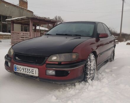 Красный Опель Омега, объемом двигателя 2.5 л и пробегом 460 тыс. км за 2500 $, фото 1 на Automoto.ua