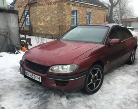 Красный Опель Омега, объемом двигателя 3 л и пробегом 320 тыс. км за 1300 $, фото 1 на Automoto.ua