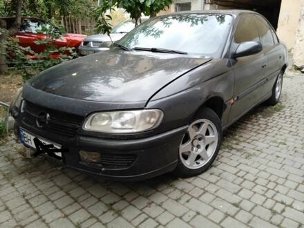 Червоний Опель Омега, об'ємом двигуна 2 л та пробігом 350 тис. км за 1300 $, фото 1 на Automoto.ua