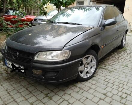 Красный Опель Омега, объемом двигателя 2 л и пробегом 350 тыс. км за 1300 $, фото 1 на Automoto.ua