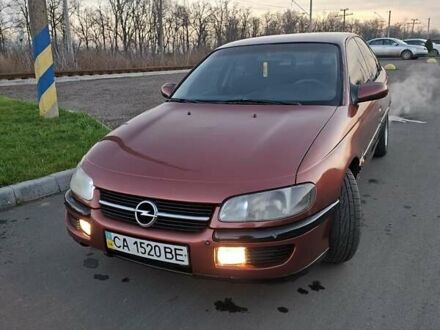 Красный Опель Омега, объемом двигателя 2 л и пробегом 400 тыс. км за 2390 $, фото 1 на Automoto.ua