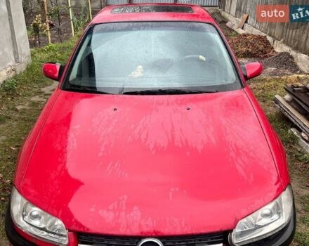 Красный Опель Омега, объемом двигателя 2.2 л и пробегом 388 тыс. км за 2199 $, фото 1 на Automoto.ua