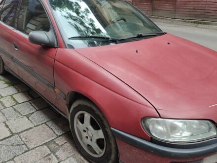 Червоний Опель Омега, об'ємом двигуна 2 л та пробігом 260 тис. км за 1300 $, фото 1 на Automoto.ua